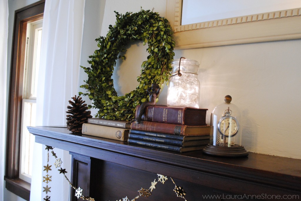 2013 Winter Holiday Mantle - live boxwood wreath vintage books pocketwatch mermaid atlas jar twinkle lights - LauraAnneStone.com